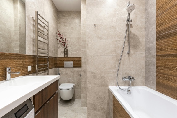 Renovated bathroom with bathtub and shower